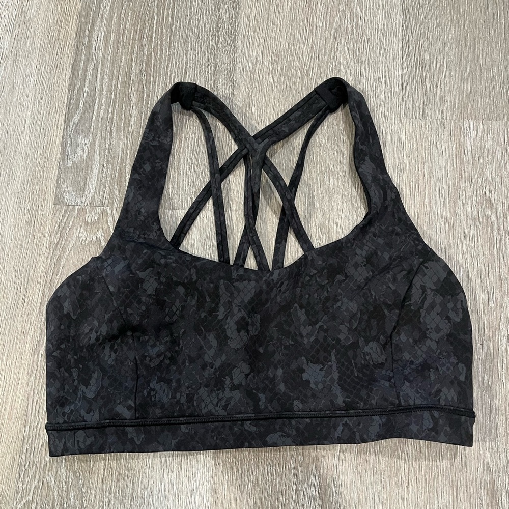 Lululemon, free to be serene sports bra in a black/grey snake print, size 8